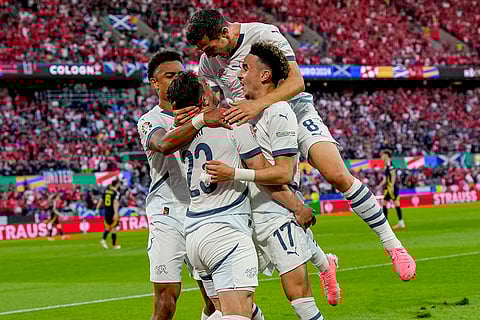 Xherdan Shaqiri and team mates celebrate after scorig a goal